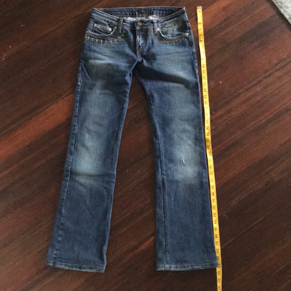 Boot cut jeans by John Richmond. Size 26/32